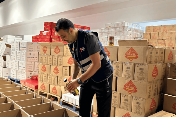 Packing Food Parcels for International Charitable Campaigns in cooperation with Ajman Coop